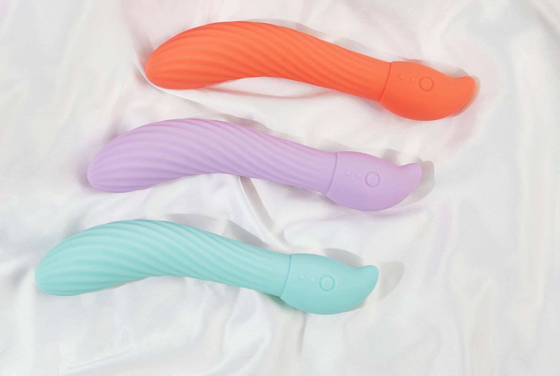 Bright yellow silicone vibrator surrounded by peeled bananas, symbolizing natural pleasure and freshness